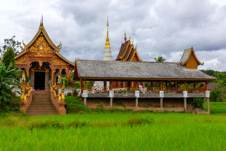 Wat Ban Thap,A beautiful old temple in the middle of the valley in Mae Chaem District, Chiang Mai Province. Northern Thailand on  15 Jun 2019のeditorial素材