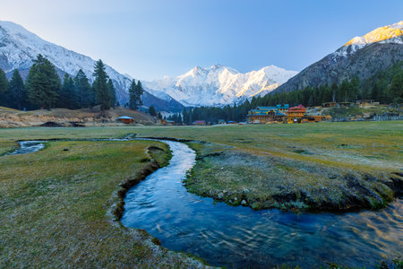 Landscape view of Himalaya mountain range and small river at sunsetの写真素材
