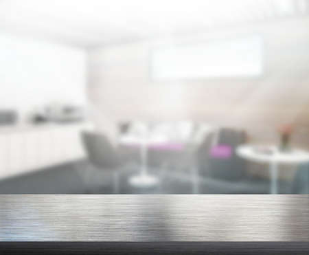 Wood Table Of Blur Background in The Officeの写真素材