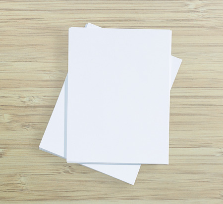 White Paper On Wood Table Of The Background