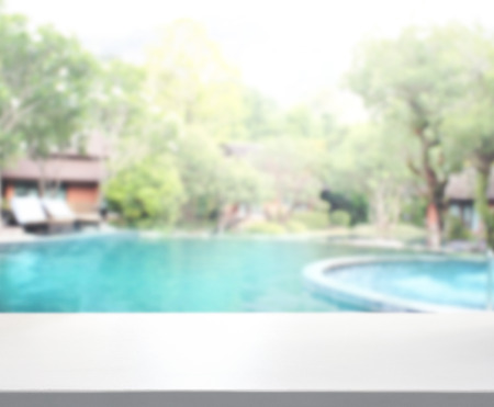 Table Top And Blur Swimming Pool Of The Backgroundの写真素材