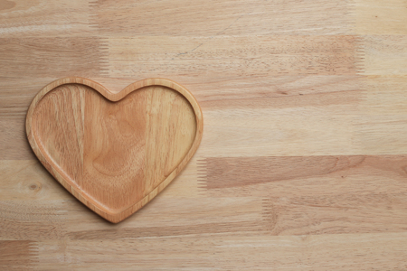 wooden table top with Kitchen ware for the backgroundの写真素材