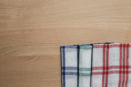 wooden table top with Kitchen ware for the backgroundの写真素材