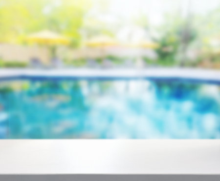 Table Top And Blur Swimming Pool Of Backgroundの写真素材