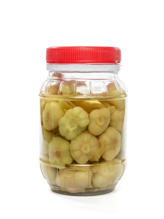 Pickled garlic  isolated on white backgroundの写真素材
