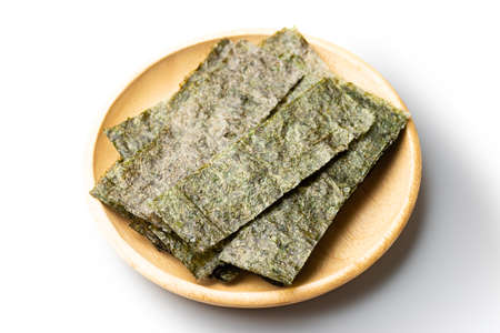 Dried seaweed on white backgroundの写真素材