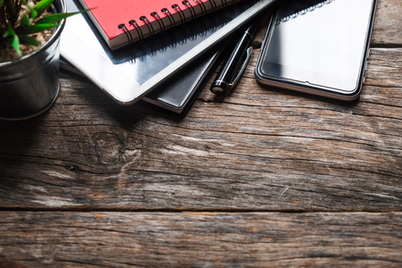 Business concept with agenda, mobile Phone,Tablet and calculator. Copy space Creative studio conceptの写真素材