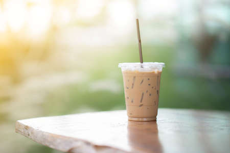 Iced coffee resting on the table background blurred