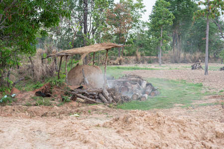 charcoal making stove,wood made from clay, used for burning charcoal,the north east of thailand.の写真素材