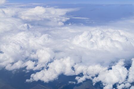Many clouds on blue sky