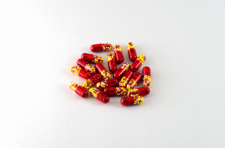 Medical pills and tablets isolated on white background.