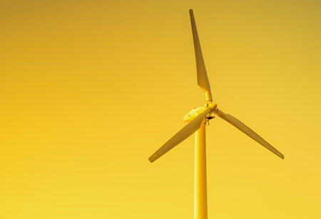 Wind turbine farm at the sunset.の写真素材