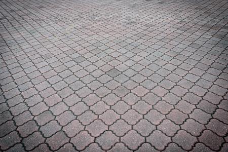 Perspective View of Monotone Gray Brick Stone on The Ground for Street Road