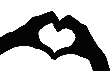 Silhouette hands in shape of love heart isolated on white background.の写真素材