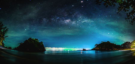 Landscape with Milky way galaxy. Night sky with stars and sea.の写真素材