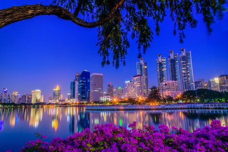 Cityscape image of Benchakitti Park at twilight time in Bangkok, Thailand.の写真素材