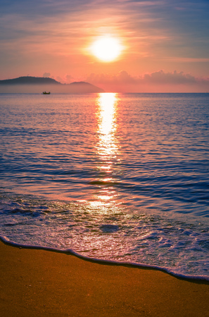 Landscapes of sunset on the beach with colorful sky background.の写真素材