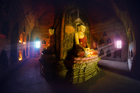 Buddha statue inside old pagoda at Bagan, Myanmar.のeditorial素材