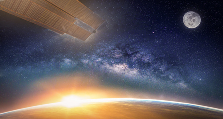 Landscape with Milky way galaxy. Sunrise, Earth, moon and satellite view from space with Milky way...