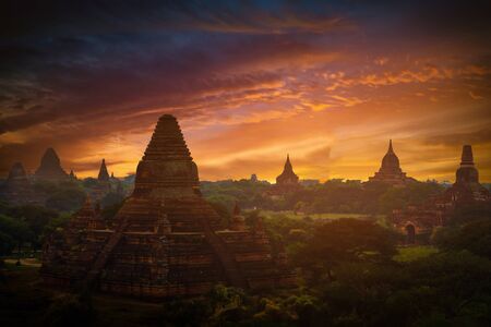 Landscape image of Ancient pagoda at sunset in Bagan, Myanmar.の写真素材