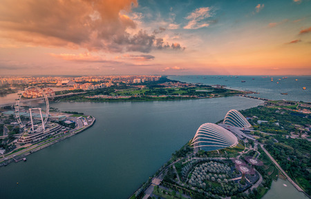 Singapore Skyline and view of skyscrapers on Marina Bay at sunset.のeditorial素材