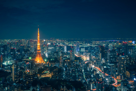 Tokyo Skyline and view of skyscrapers on the observation deck at night time in Japan.の写真素材