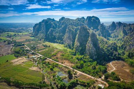 Aerial view of Limestone mountain and rice field in Noen Maprang district, Phitsanulok, Thailand.