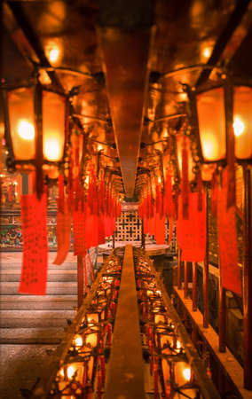 Hong Kong, China - 30 July, 2019:Interior scene of Man Mo Temple which is the one of the most holy temple in Hong Kong. Man Mo Temple is a temple for the worship of the civil or literature god Man Tai and the martial god Mo Tai.のeditorial素材