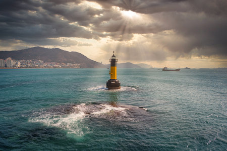 Lighthouse with Haeundae beach at sunset in Busan, South Gyeongsang Province, South Korea.の写真素材