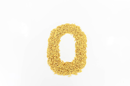 Jasmine rice arranged a number zero on white background.の写真素材