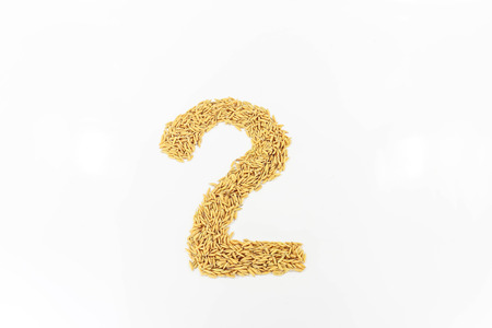 Jasmine rice arranged a number seven.on white background.の写真素材