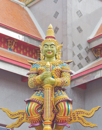Giant statue holding a rod in Wat Phutthaisawan in Ayutthaya historical park of Ayutthaya Province, Thailandのeditorial素材