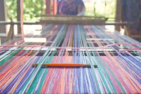 Thailand silk woven by local people of northeastern Thailand.の写真素材