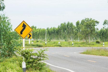 Roadside traffic sign in a rural area.
