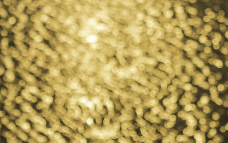 Bokeh caused by light reflecting the surface of the waterの写真素材