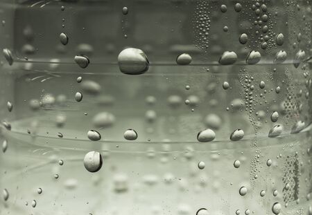 The water droplets on the plastic water bottle