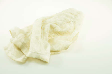 Dirty rags isolated on a white backgroundの写真素材