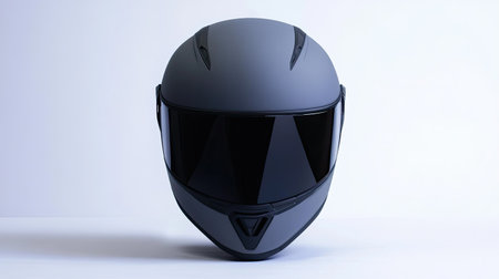 Premium motorcycle helmet with reflective detailing and ergonomic design, set against a bright white backdrop.の素材