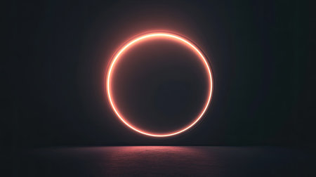 Elegant circle of light with a gradient glow effect on a black backdrop, evoking a sense of mystery and sophistication in a minimalist styleの素材