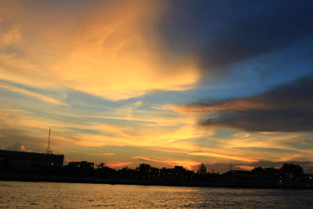 Sunset in Chao Phraya riverの写真素材