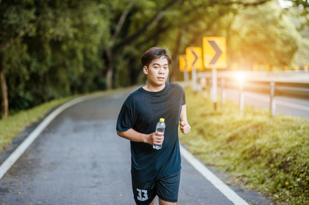 Active healthy runner jogging outdoorの写真素材