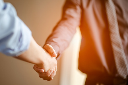 Business people shaking hands.business and office concept .の写真素材