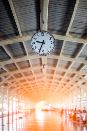 clock in the train station on background.の写真素材