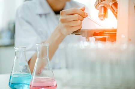 a laboratory microscope with microscope slide.research and development concept.の写真素材