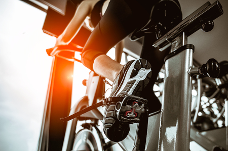 Fitness woman working out on exercise bike at the gym.exercising concept.fitness and healthy lifestyleの写真素材