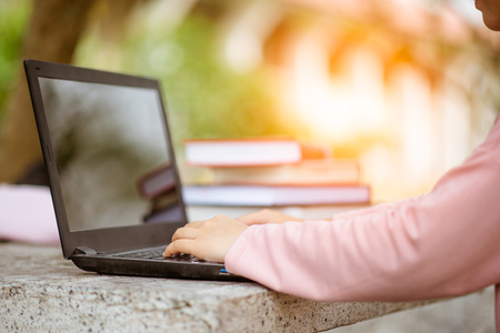 Young woman using laptop computer.の写真素材