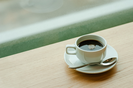 cup of coffee background in the morning sunlight.の写真素材