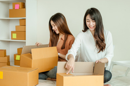 beautiful women owner business woman work at home for online shopping .online business conceptの写真素材