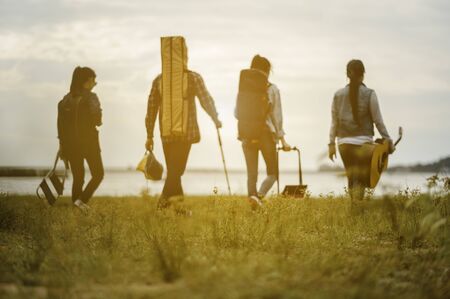 Blurred of the group of friends who enjoy hiking in the forest are looking for a tent to relax.の写真素材