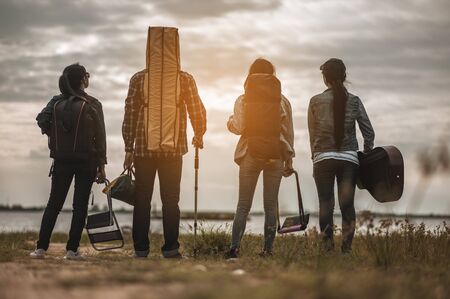Blurred of the group of friends who enjoy hiking in the forest are looking for a tent to relax.の写真素材